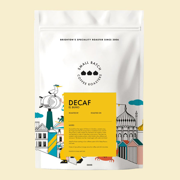 small batch Coffee package with 'Decaf El Buho' label on a light yellow background