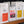 Assorted coffee bean packages on a shelf with visible branding.